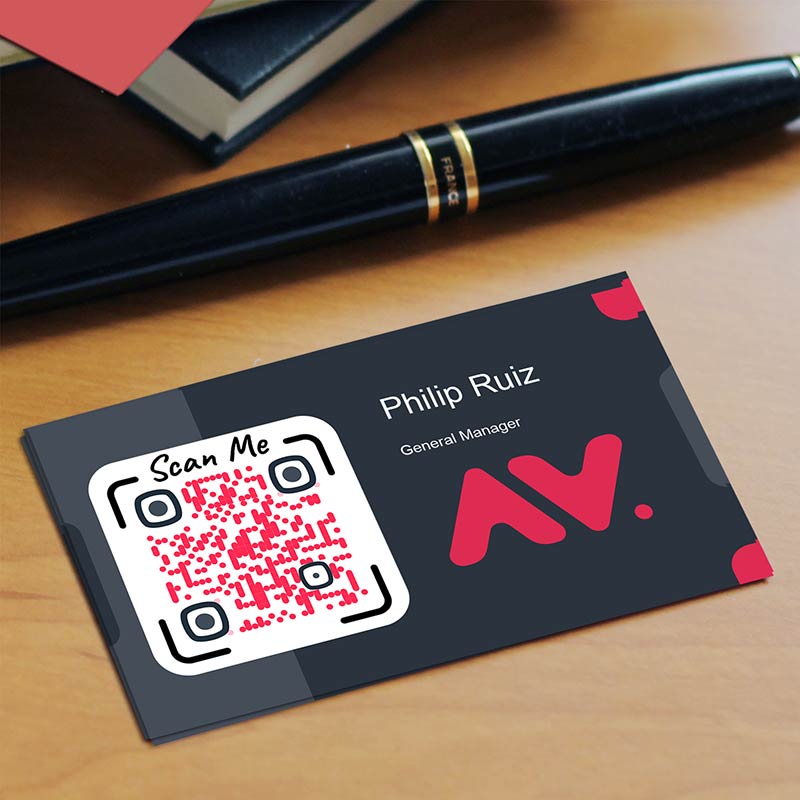 Card with a QR code for a Business Card placed on the table