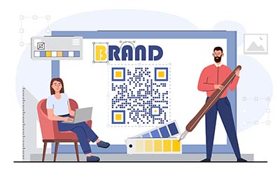 People working on their brand design on a huge laptop screen