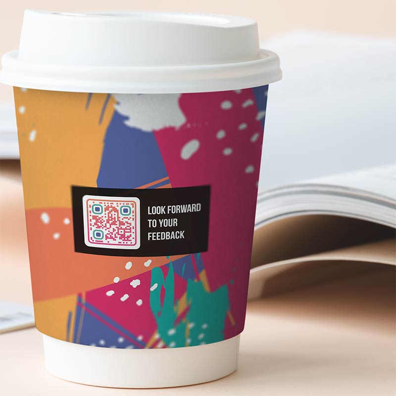 Feedback QR code on a coffee cup