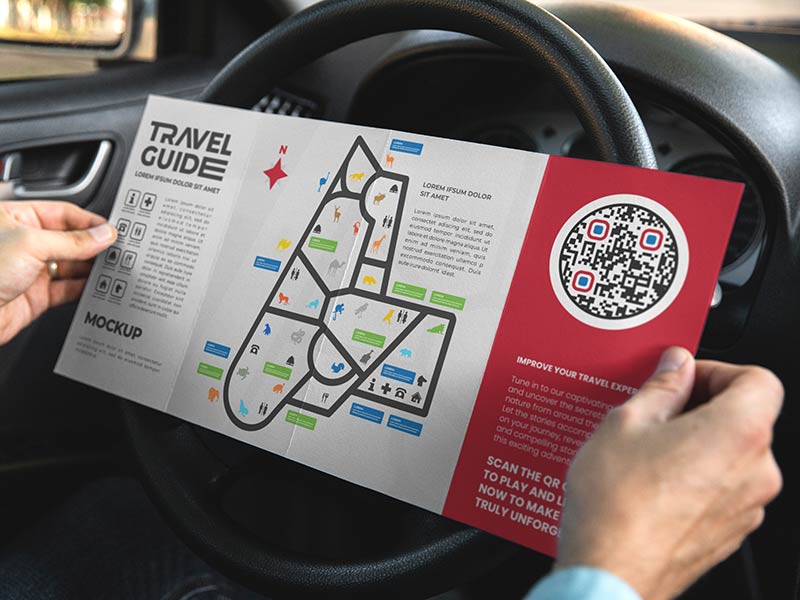 QR code in travel guide opened by a person who’s in a car